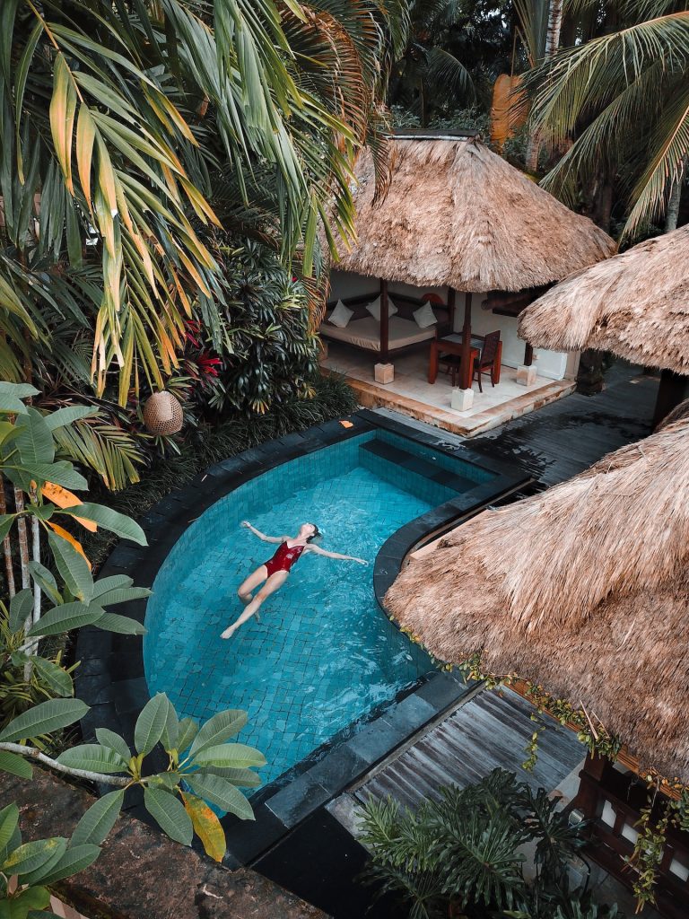 5f6c53c18c95b22ba8f63708_woman-soaking-on-the-swimming-pool-3225531